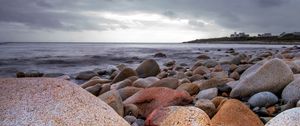 Preview wallpaper stones, boulders, landscape, sea, shore, horizon