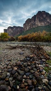 Preview wallpaper stones, branches, river, mountains, nature