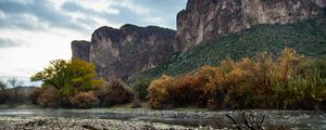 Preview wallpaper stones, branches, river, mountains, nature