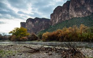 Preview wallpaper stones, branches, river, mountains, nature