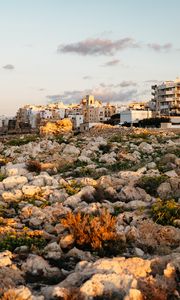 Preview wallpaper stones, buildings, sunlight, city