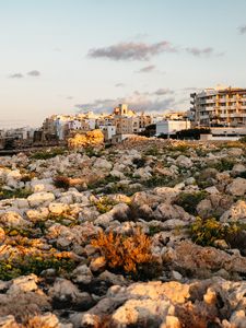 Preview wallpaper stones, buildings, sunlight, city