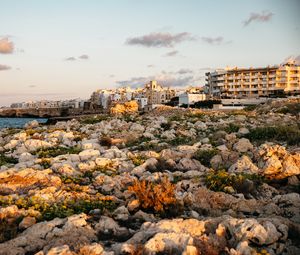 Preview wallpaper stones, buildings, sunlight, city