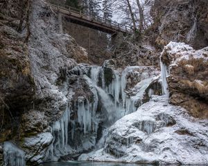 Preview wallpaper stones, cliff, ice, icicles, lake, bridge