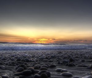 Preview wallpaper stones, coast, beach, wave, sand, evening, decline