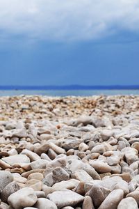 Preview wallpaper stones, coast, beach, figure