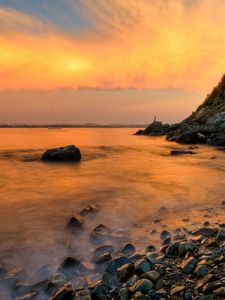 Preview wallpaper stones, coast, fog, rocks, water, decline, evening