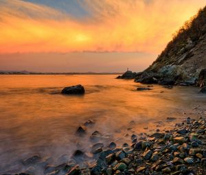 Preview wallpaper stones, coast, fog, rocks, water, decline, evening