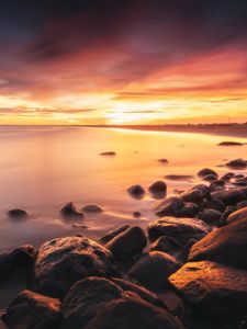 Preview wallpaper stones, coast, horizon, sunset