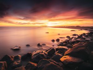 Preview wallpaper stones, coast, horizon, sunset