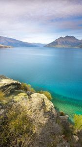 Preview wallpaper stones, coast, lake, water table, vegetation