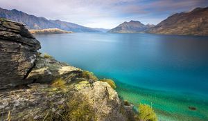 Preview wallpaper stones, coast, lake, water table, vegetation