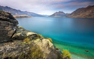 Preview wallpaper stones, coast, lake, water table, vegetation