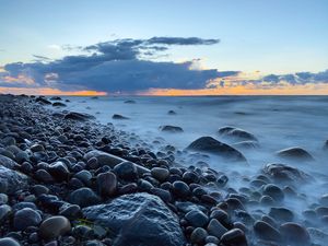 Preview wallpaper stones, coast, pebbles, sea, sky