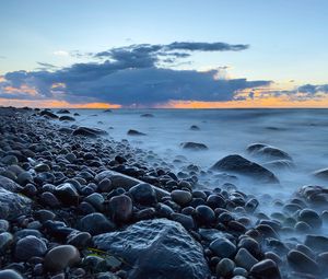 Preview wallpaper stones, coast, pebbles, sea, sky