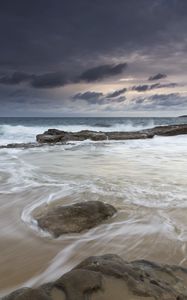 Preview wallpaper stones, coast, sea, surf, sky