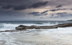 Preview wallpaper stones, coast, sea, surf, sky