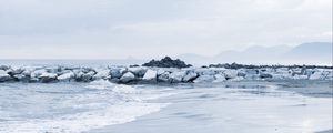 Preview wallpaper stones, coast, sea, surf, horizon