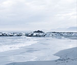 Preview wallpaper stones, coast, sea, surf, horizon