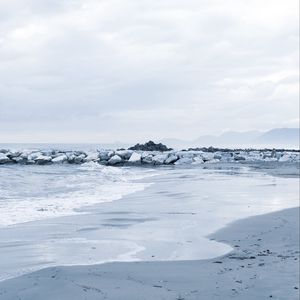 Preview wallpaper stones, coast, sea, surf, horizon