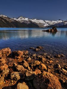 Preview wallpaper stones, coast, water, lake, transparent, mountains