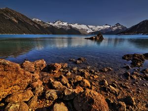 Preview wallpaper stones, coast, water, lake, transparent, mountains