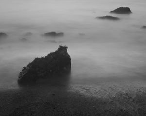 Preview wallpaper stones, fog, sea, black and white