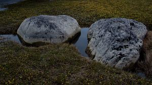 Preview wallpaper stones, grass, shore, sea, twilight