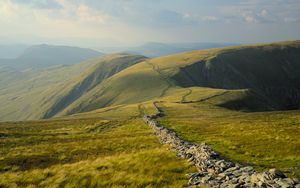 Preview wallpaper stones, hills, grass, lines, landscape