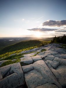 Preview wallpaper stones, hills, rays, sun