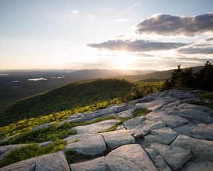 Preview wallpaper stones, hills, rays, sun