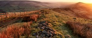 Preview wallpaper stones, hills, valley, pastures, fields, protection, evening