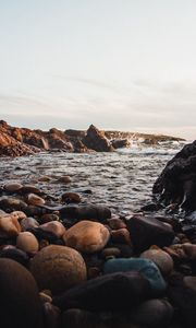Preview wallpaper stones, jackdaws, rocks, sea, sky