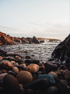 Preview wallpaper stones, jackdaws, rocks, sea, sky
