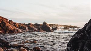 Preview wallpaper stones, jackdaws, rocks, sea, sky