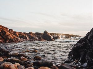 Preview wallpaper stones, jackdaws, rocks, sea, sky
