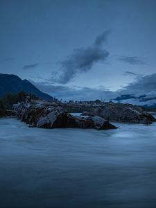 Preview wallpaper stones, lake, sky, clouds, evening, landscape