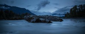 Preview wallpaper stones, lake, sky, clouds, evening, landscape