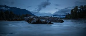 Preview wallpaper stones, lake, sky, clouds, evening, landscape