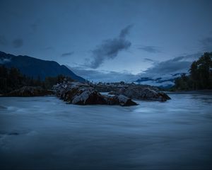 Preview wallpaper stones, lake, sky, clouds, evening, landscape
