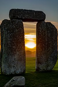 Preview wallpaper stones, megalith, sunset, stonehenge, england