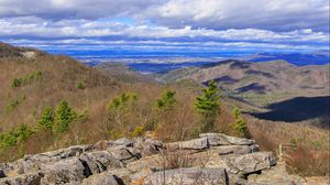 Preview wallpaper stones, mountains, trees, clouds