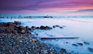 Preview wallpaper stones, pebble, coast, evening, fog, malaysia, resort