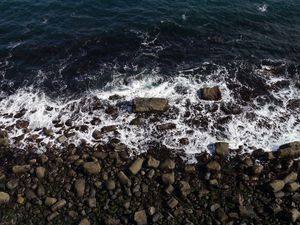 Preview wallpaper stones, pebbles, coast, sea, foam