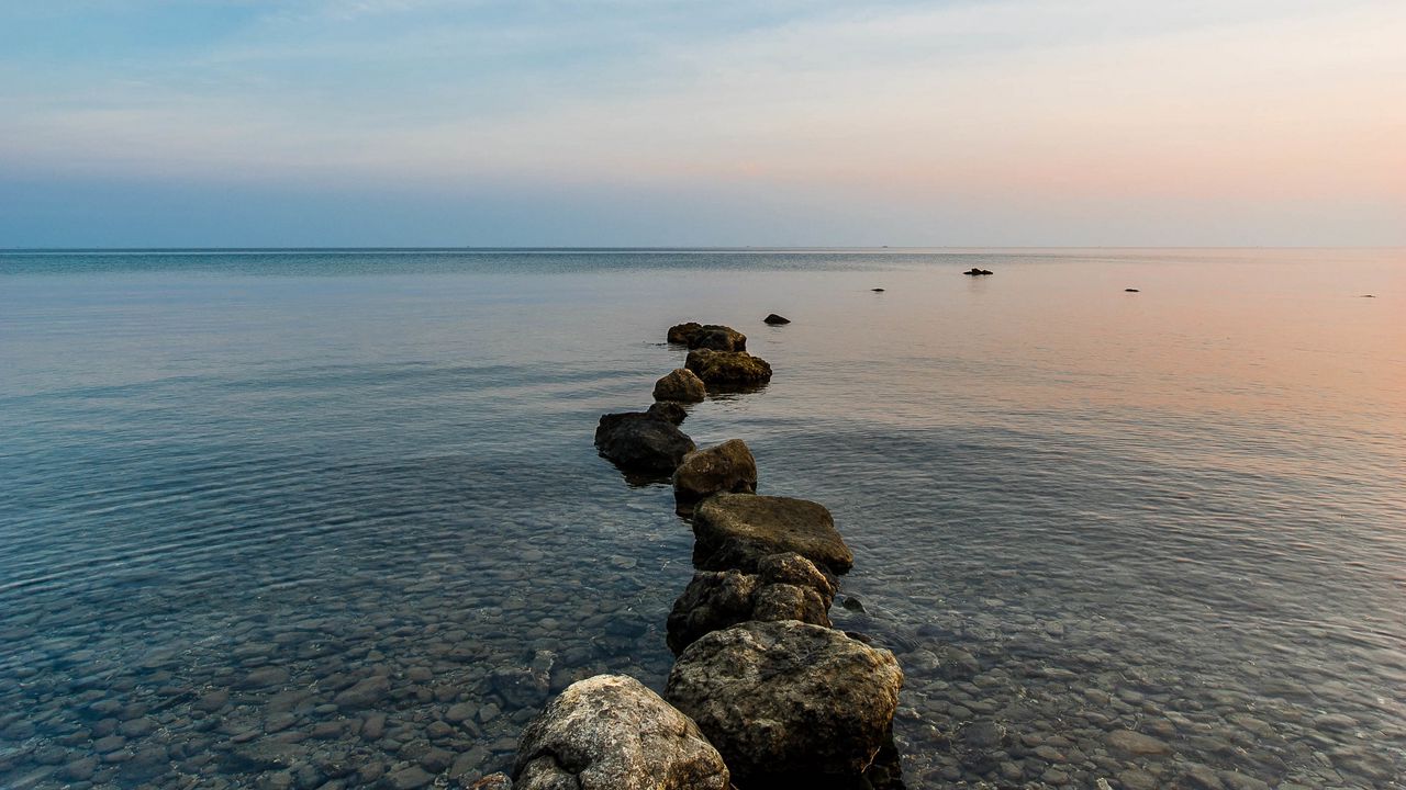 Wallpaper stones, pebbles, sea, horizon, sky