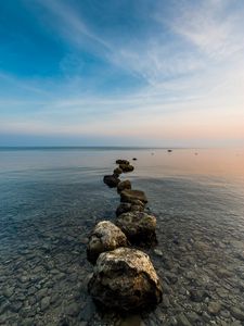 Preview wallpaper stones, pebbles, sea, horizon, sky