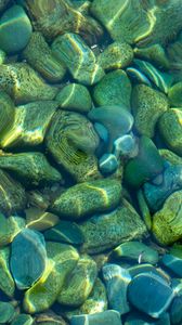 Preview wallpaper stones, pebbles, water, glare, distortion