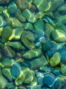 Preview wallpaper stones, pebbles, water, glare, distortion