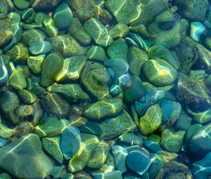 Preview wallpaper stones, pebbles, water, glare, distortion