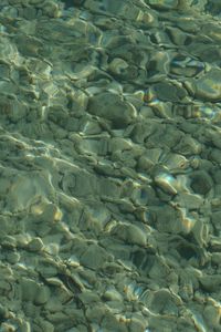 Preview wallpaper stones, pebbles, water, underwater, glare, minimalism